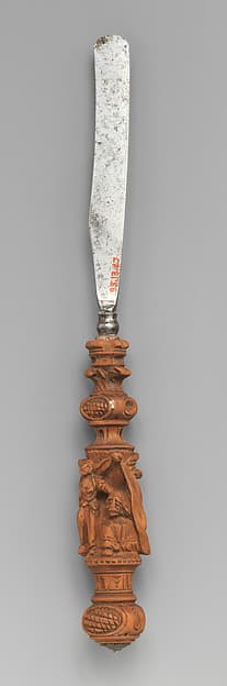 Fruit knife with carved scene from the story of Judith and Holofernes