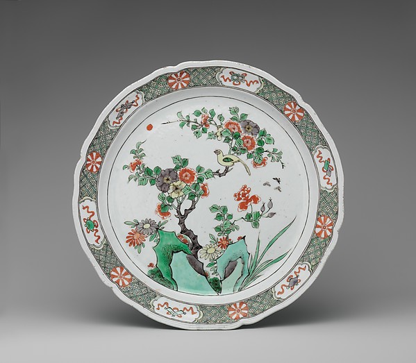 Dish with rocks, flowers, and birds