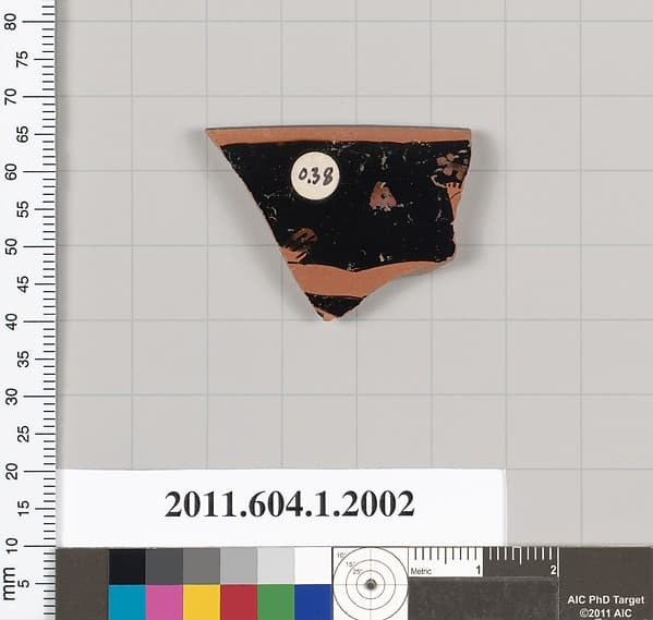 Terracotta rim fragment of a kylix (drinking cup)