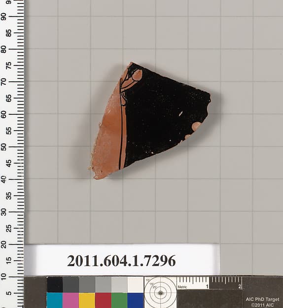 Terracotta fragment of a kylix (drinking cup)