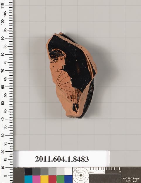 Terracotta fragment of a stemless kylix (drinking cup)